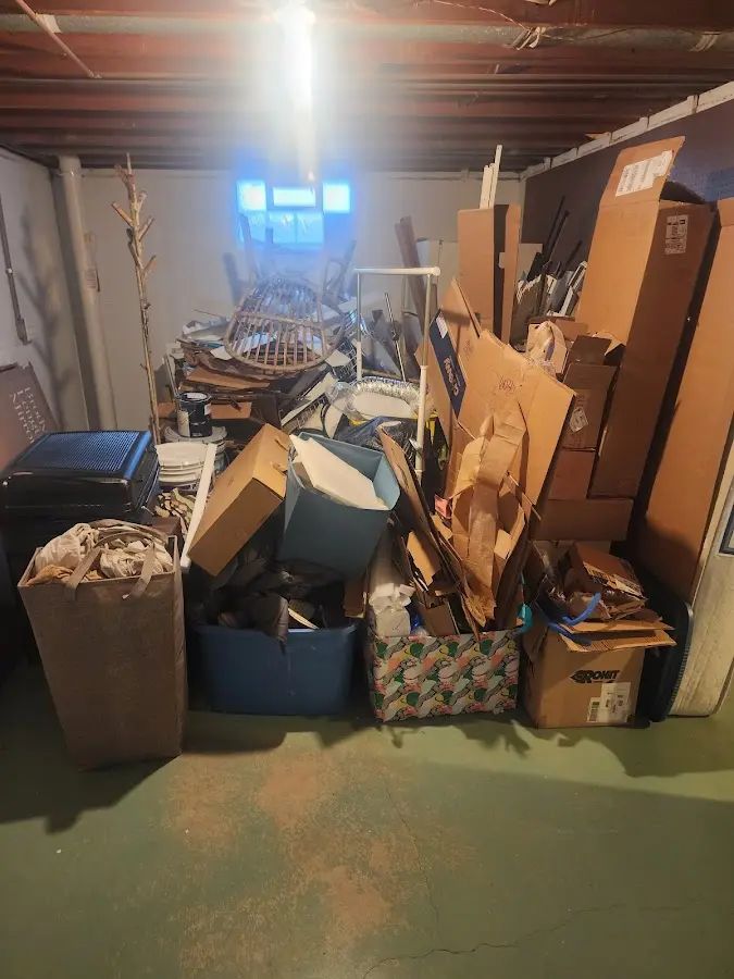 Roll-off dumpster container at job site for 2 Yard Dumpster Rental in Mobile